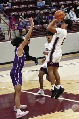 Littlefield sophomore, Sammy Saenz, pulls up for a jumper from the left elbow, during the first half of the Wildcats’, 76-44, victory over the Bobcats on Tuesday in their first meeting of district play. (Staff Photo by Derek Lopez)