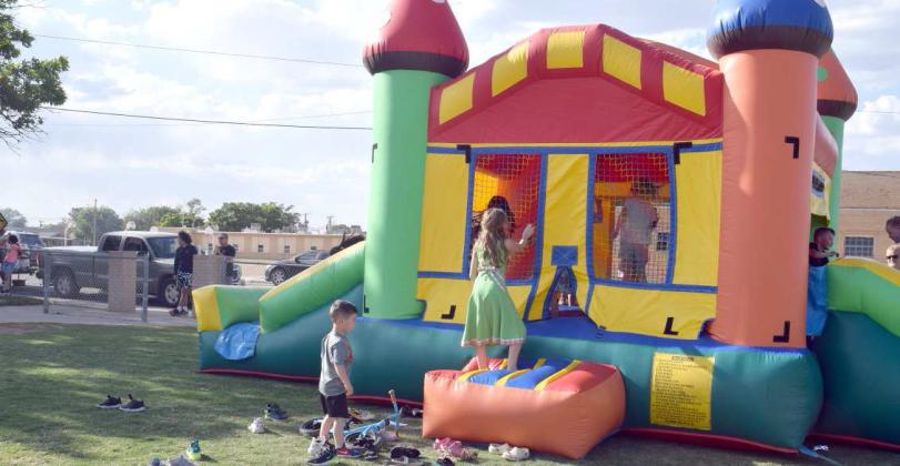 It was a “kick your shoes off, bouncy house” wonderful day at the Littlefield Primary’s” Books, Bikes, and Burgers” event held on Tuesday, May 9, 2023. Families were invited to bring bikes to ride in the parking lot, have a hamburger, play, visit, and shop for books. The Bounce House was generously provided by Lamb County Electric Cooperative and Medrano’s Jumpers. (Photo by Ann Reagan)