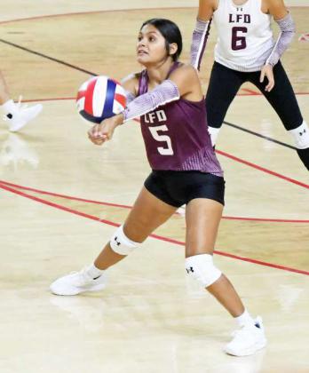 Littlefield’s Monica Elizondo breaks the serve from the Fillies, during the Lady Cats’ first set with Denver City on Tuesday night. (Staff Photo by Derek Lopez