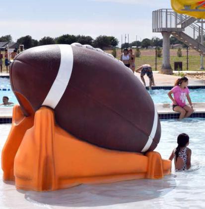 The Football Slide is very popular with the little ones at the Littlefield Aquatic Center. (Photo by Ann Reagan)