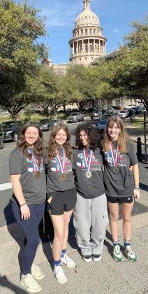 The second and third place winners of the UIL CX Debate State Championship, Emma Armstrong, Denise Gonzalez, Garicyn Bigham and Jolie Dyck, pose in front of the Texas Capitol in Austin, Texas. (Submitted Photo)