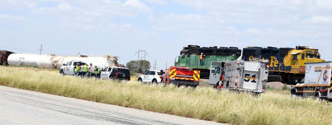 This BSNF train derailed two miles west of Amherst as the result of a collision with a truck at the Hwy 84 and County Road 125 railroad crossing. Texas Department of Public Safety shut down the westbound lane of Hwy 84 from the County Road 125 crossing for two miles to the Amherst railroad crossing. Traffic was diverted into Amherst and over to Sudan. (Photo by Ann Reagan)