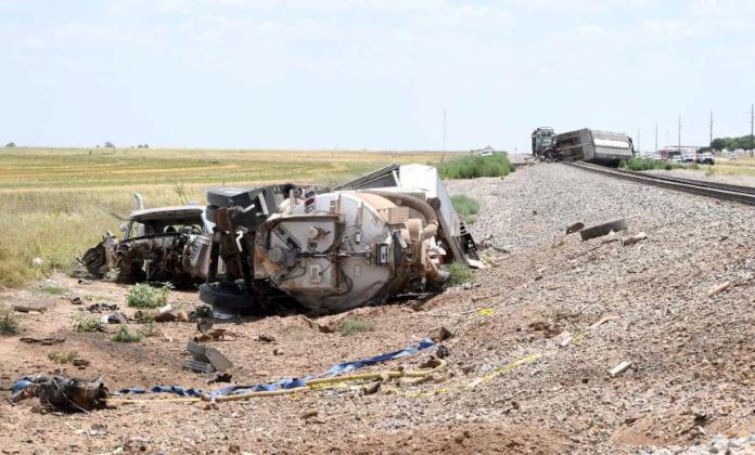 The crash debris left by the Western Pump truck which collided with the train at the County Road 125 Crossing two miles west of Amherst. (Photo by Ann Reagan)