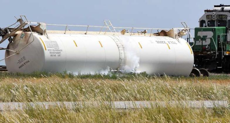 Co2 can be seen escaping a tanker of the BSNF train following a collision and derailment two miles west of Amherst on Monday, July 31,2023. The materials the train was carrying were deemed a low hazard to the public. (Photo by Ann Reagan)