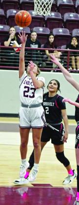Littlefield’s Cobi Saldana (23) gets into the paint for a lay-up, during the first half of the Lady Cat’s victory over Roosevelt on Wednesday at Wildcat Gym. (Staff Photo by Derek Lopez)