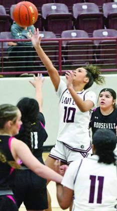 Littlefield’s Zalise Davis (10) gets into the paint for a floater, during the first half of the Lady Cat’s victory over Roosevelt on Wednesday at Wildcat Gym. (Staff Photo by Derek Lopez)