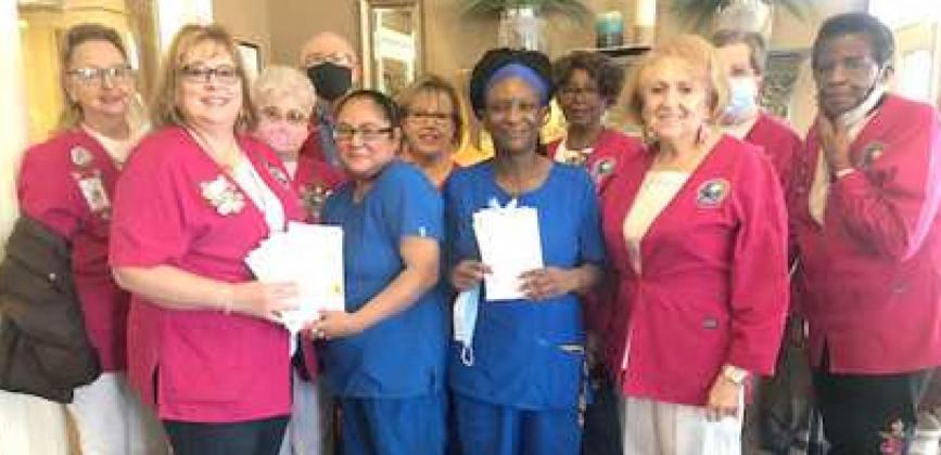 LHC AUXILIARY’S PRESENTATION—Members of Lamb Healthcare Center’s Auxiliary are shown as cards were presented to Michelle Vienna (an employee, fourth from left) of Library of Legacies, that were delivered to residents of the Library of Legacies. Shown, left to right are Edie Pene, Lori Durham (with the cards), Joan Harrell, Harry Heckard, Janet Conkin, Shalonda Martindale (employee), Retha Williams, Janice Sokora, Gayle Heckard, and Betty Kemp. (Submitted Photo)