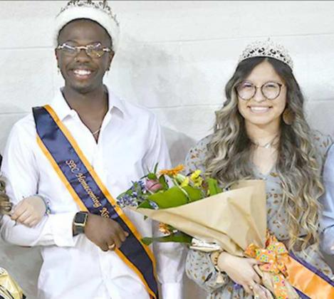 SPC HOMECOMING HONORS — Students at South Plains College selected Demarcus Sneed of Lakeland, Fla., (left) and Kamryn Alvarez of Earth (right) as Homecoming King and Queen dring halftime of the Texans/Western Texas College basketball game on Thursday, March 11, in the Texan Dome. Sneed, a business major, represented the Sixth Man. Alvarez, a video and cinema major, represented Catholic Family Ministry. The contest was open to all student organizations, clubs and residence halls. (SPC Photo/Wes Underwood)