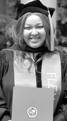Sudan H.S. alumna Arissa Moore graduates from the Seattle University School of Law.