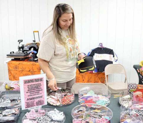 Zays Creationz &amp;amp; Trucker Vibez hat bar by Karina Curiei was at the Littlefield Trade Day to make custom Caps, Boujee hats, Belt Bags, Coozies and more at the Lamb County Ag Center in Littlefield on Saturday, October 12, 2024. (Photo by Ann Reagan)