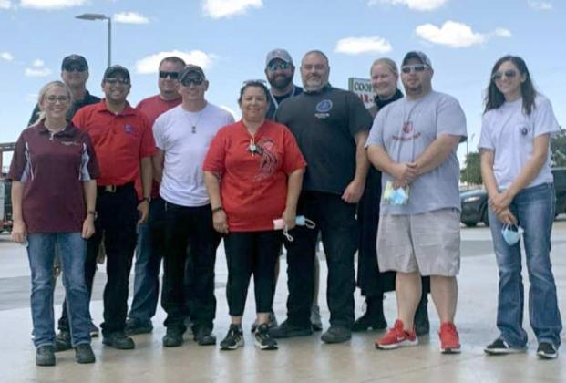 EMS VOLUNTEERS TO HURRICANE AREA--Two Littlefield EMS staff are among these volunteers from Bailey County EMS, University Medical Center’s EMS, Covenant EMS, Scurry County EMS and Booker EMS, who assisted with evacuations before and during the Hurricane Marco and Laura storms. Tonya Saenz is on the front left, while Louisa Martinez is wearing the red shirt in the center front. They are the members of the EMTS AST1 Strike Team. (Littlefield EMS Photo)