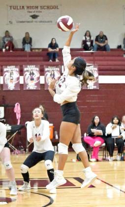 Senior, Amiah Elizondo, goes up for a hit, during the second set of the Lady Cats’, 3-2, victory on the road on Tuesday night over Tulia, keeping their play-off hopes alive. (Staff photo by Derek Lopez)