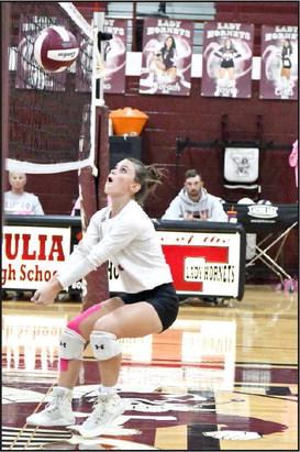 Sophomore, Bryndle Ray, plays a ball off of the net to keep the play alive, during the second set of the Lady Cats’, 3-2, victory on the road on Tuesday night over Tulia, keeping their play-off hopes alive. (Staff photo by Derek Lopez)