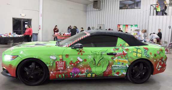 The Grinch car on display at the toy drive held by Zeke’s Event Center of Littlefield on Sunday, December 3, 2023. (Photo by Ann Reagan)