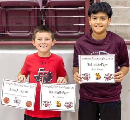 Taos Duncan and Isahi Vargas received ‘Most Valuable Player’ awards at the Littlefield Basketball Camp on June 19, 2025. (Photo by Madison Vidales)