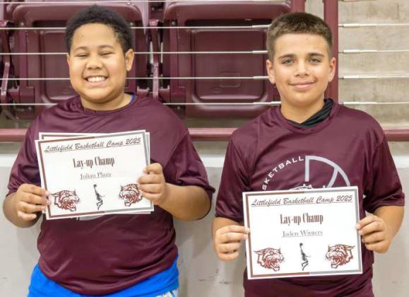 Julian Plaza and Jaden Winters received ‘Lay-up Champ’ awards at the Littlefield Basketball Camp on June 19, 2025. (Photo by Madison Vidales)