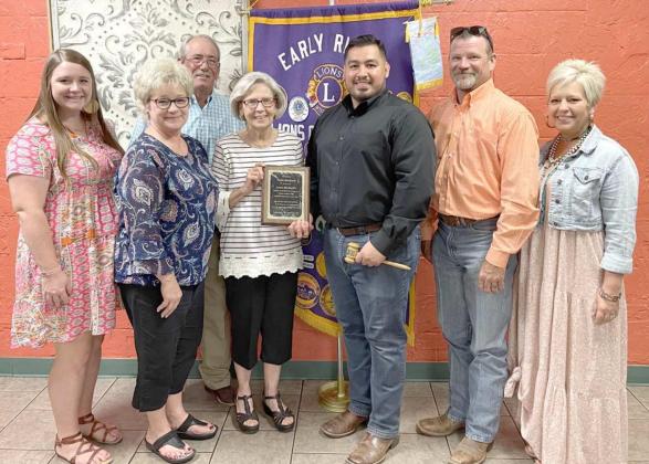 Early Risers present special plaque; officers re-elected