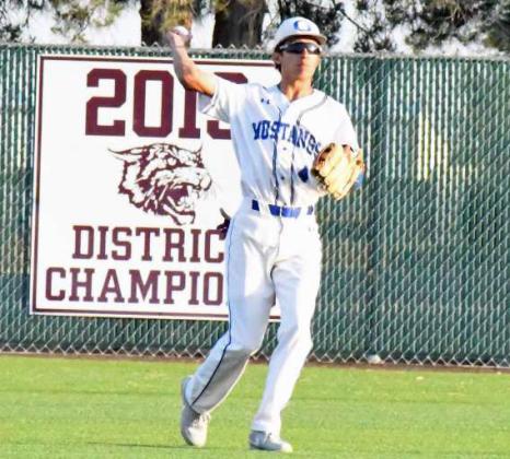 Olton’s Eddie Ramirez gets the ball in from the outfield, during the Mustangs, 9-0, Bi-district loss to Ropes on Thursday in Littlefield. (Staff Photo by Derek Lopez)