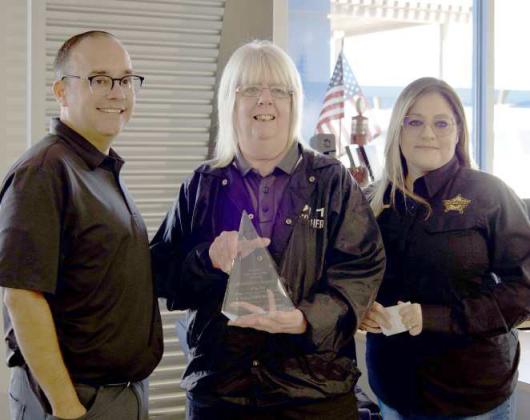 Rick Martinez, Dealer Partner and General Manager, Ann Robison, First Responder of the Year Recipient, and Bertha Coronado, Telecommunications Supervisor for Lamb County, pose for a photo on Oct. 16. (left to right). (Staff Photo by Rhode Duenas)