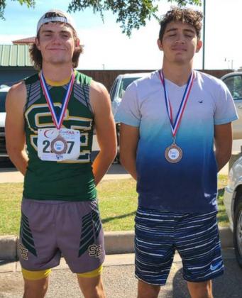 BRINGING HOME THE HARDWARE – The Springlake-Earth Wolverines’ varsity cross country team competed a the Lubbock ISD Invitational on Saturday, where Josh Samaron (right) placed ninth and Trace Goodman (left) placed 15 th overall. (Submitted Photo)