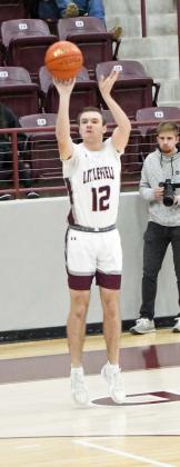 Littlefield’s Chip Green spots up for a three from the right elbow for three of his career high 30 points, during the first half of their contest against Dimmitt on Tuesday at Wildcat Gym. (Staff Photo by Derek Lopez)