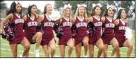 The Wildcat Varsity cheerleaders are shown getting the crowd fired up, during Meet the Wildcats last Thursday at Wildcat Stadium. (Staff Photo by Derek Lopez)