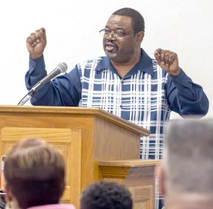 Keynote speaker New Hope Baptist Church Pastor James Price Jr. preaches to attendees of the Amherst Chamber Banquet on April 10, 2025. (Staff Photo by Madison Vidales)