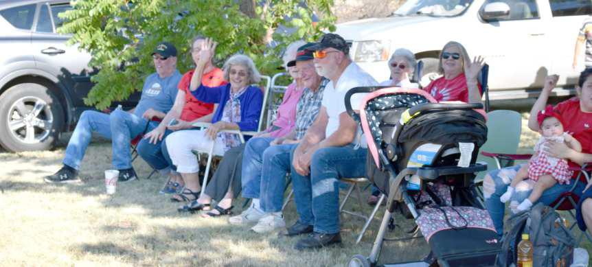 These folks are having a great time during the parade! Do you know them?