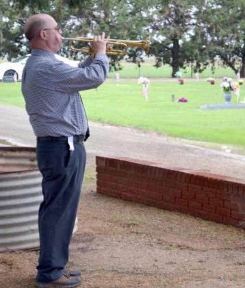 PLAYING TAPS AT EARTH