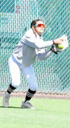 Littlefield junior, Cali Saldana, make a catch in center field for an out, during the Lady Cats, 11-6, home victory over the Lamesa Golden Tornadoes last Saturday. (Staff Photo by Derek Lopez)
