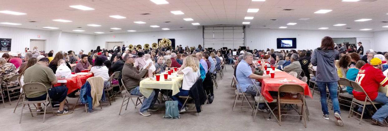 Guests enjoy a Thanksgiving meal prepared by the Littlefield Band Booster at the Ag. Center on Nov. 10, 2024. (Photo by Rhode Duenas)