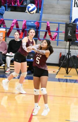 Littlefield’s Monica Elizondo, bumps a ball into position, as the Lady Cats look to go on the attack against Childress, during their road district match-up on Tuesday. (Staff Photo by Derek Lopez)