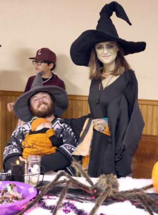 Dylan and Laura Spann with their “Lil Punkin” at the Crescent Park Church of Christ Trunk or Treat.