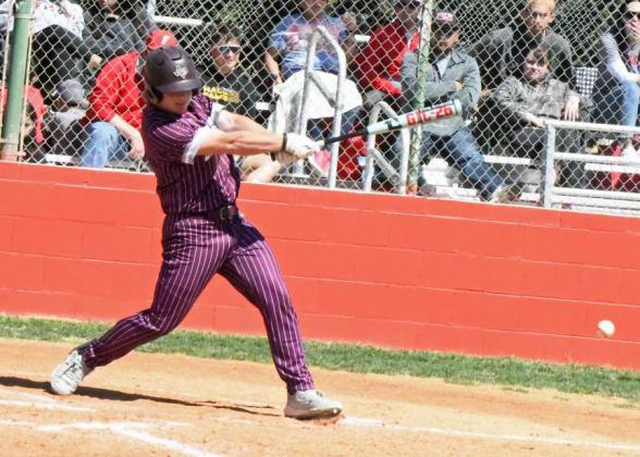 Littlefield senior, Jakob Kirkland, hits a shot towards shortstop that was fielded by Friona’s Mason Ramos, but the throw to first was off the mark, allowing a run to score on the play, as the Wildcats took down Friona, 10-1, on Saturday in district play. (Staff Photo by Derek Lopez)
