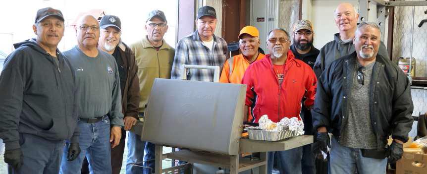 The Knights of Columbus cooked hamburgers and hot dogs for the community of Littlefield on Halloween as usual. These great guys must have fed half the community. (Photo by Ann Reagan)