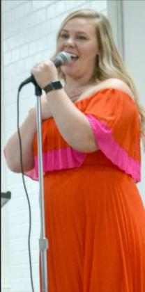 ROBYN STEVENSON sang “South of the Border”, and “Vaya con Dios” during the entertainment for the banquet. (Staff Photo by Joella Lovvorn)