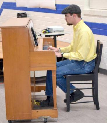 SHILOH HAMILTON, piano student of Olton’s Harold Dean Carson, who is now a senior at Wayland Baptist University, played a couple of enjoyable numbers on the piano. Because (Staff Photo by Joella Lovvorn)