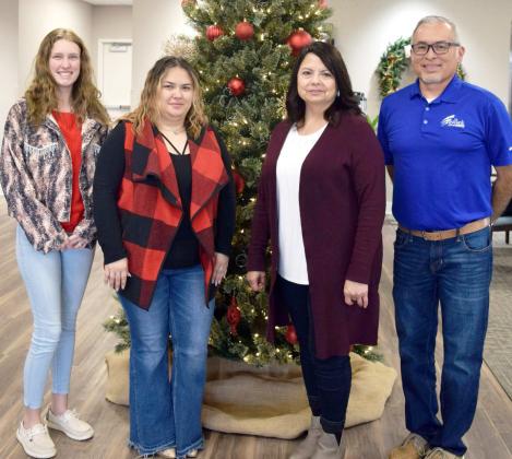 ChasityGray, Mayra Trejo, Elsa Rendon, and Manager, Rene Nevarez welcomed guests with coffee, Wassail punch, and lots of sweet treats during their all-day Christmas Open House held on Friday, December 16, 2022. (Photo by Ann Reagan)
