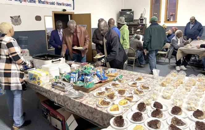 Guests go through the buffet line at Peace Delivery Baptist Church, during the 2nd annual John D. McCarty Day celebration. (Submitted Photo)
