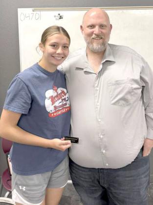 Lamb County Farm Bureau’s Ag Student for the Month of May was presented to Maggie McNeese, left, by Clay Hollis, Agency Manager in Littlefield. (Submitted Photo)