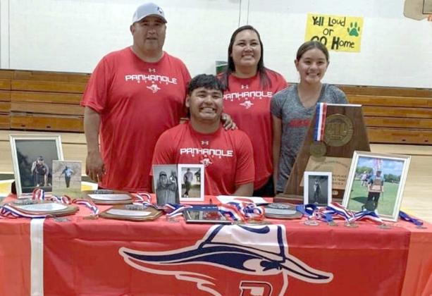 Springlake-Earth senior, Xavyer Mosqueda, signed his Letter of Intent to continue his golf and academic career at the Collegiate level at Oklahoma Panhandle State University. Mosqueda signed in the SEHS Gym during a small ceremony, surrounded by family, friends and classmates. (Submitted Photo)