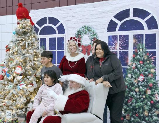 Santa and Mrs. Clause were on hand for photos at the Littlefield Primary School Open House on Monday, December 11, 2023. (Photo by Ann Reagan)