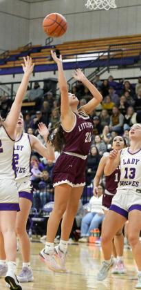 Littlefield’s Ari Castillo gets into the paint and drops in a lay-up during the first half of the Lady Cats’ Bi-district loss to Dalhart in Canyon on Monday. (Staff Photo by Derek Lopez)