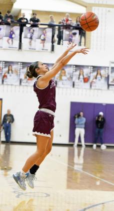 Littlefield’s Bri Martinez fires up a three from the right elbow, during the first half of the Lady Cats’ Bi-district loss to Dalhart in Canyon on Monday. (Staff Photo by Derek Lopez)