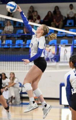 Olton’s Analise Ramage kills a ball at the net, during the Fillies’ third set against the Lady Lopes in their home district-opener on Tuesday at Mustang Gym. (Staff Photo by Derek Lopez)