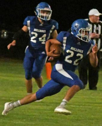 BREAKING LOOSE – Amherst freshman running back, Kevin Garcia, breaks loose for a big run, during last week’s Homecoming victory over Wellman-Union at Bulldog Stadium. (Staff Photo by Derek Lopez)