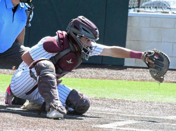 Littlefield catcher, Jayden Kirkland, squeezes a pitch from Chip Green, looking for a strike call, during the Wildcats’ contest with the Roosevelt Eagles on Saturday at Wildcat Field. (Staff Photo by Derek Lopez)