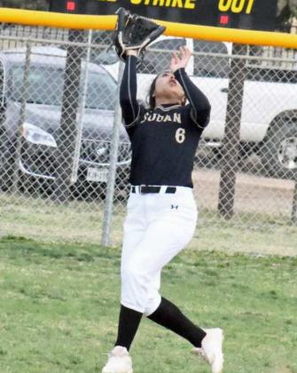 FINDING THE BALL – Sudan’s Hailey Flores tracks down a fly ball in left field for an out, during the top of the second inning of the Nettes’ victory over Lockney on Tuesday, 14-4. (Staff Photo by Derek Lopez)