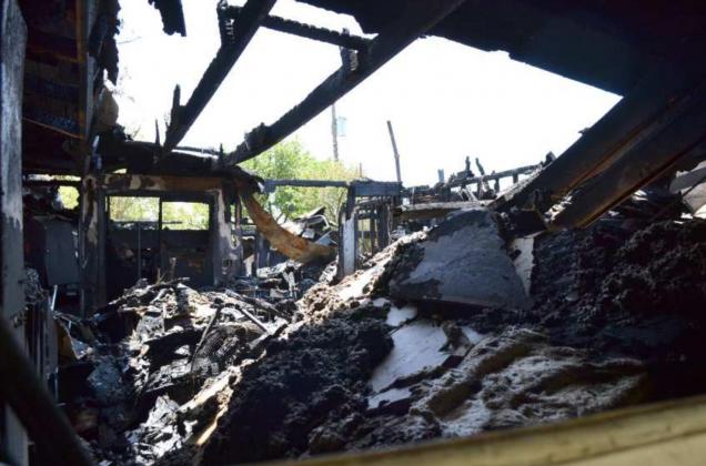 Fire damages residence on East 23rd St.