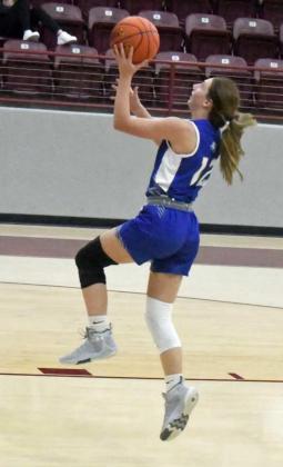 FAST BREAK – Olton’s Kylee Noack (12) sprints down the floor for an easy lay-up on the fast-break, during the second half of the Fillies loss to Littlefield in their tournament-opener on Monday night at the Wildcat Classic. (Staff Photo by Derek Lopez)